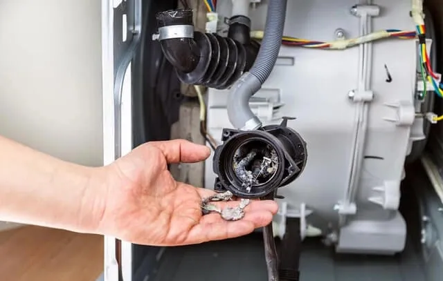 Машинка течёт снизу из-за засора сливной системы Машинка течёт снизу из-за засора сливной системы